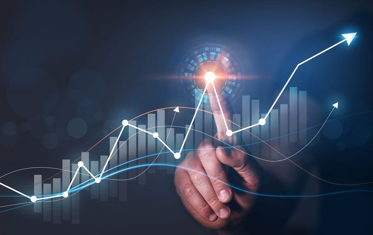 The entrepreneur setting up the financial goals by examining the growth chart