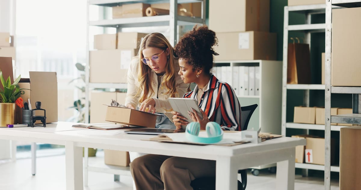 Small business people or seller with digital tech, box and clipboard for website order
