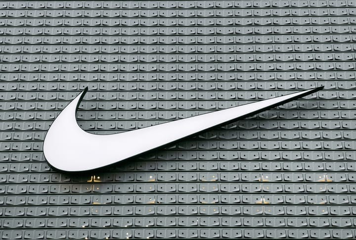 Nike swoosh logo.