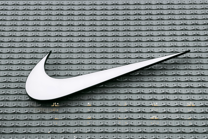 Nike swoosh logo.