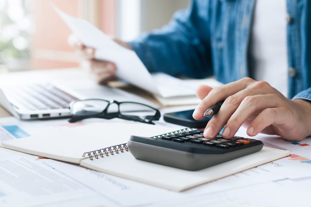 Calculating taxes, profit, and loss with a calculator