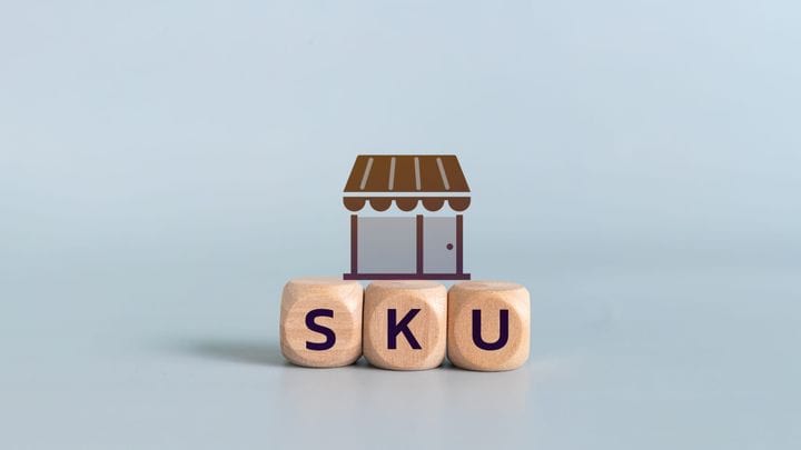 Wooden blocks with SKU text and shop icon representing inventory management, retail business, product identification, and e-commerce solutions.